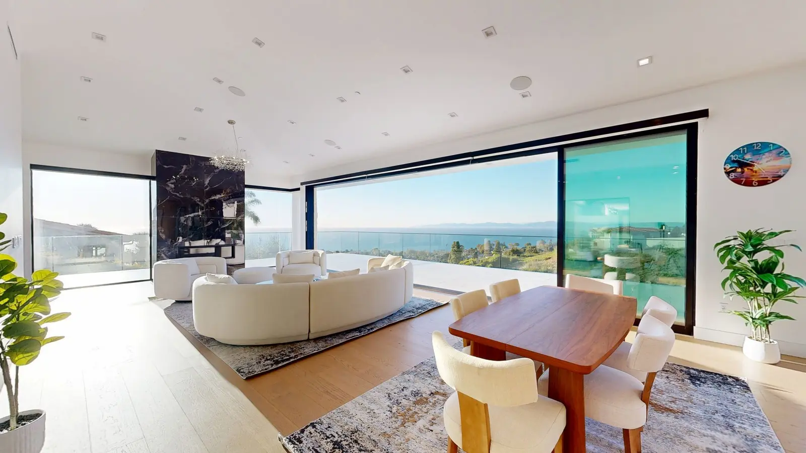 Still from a MEDIA360VR Matterport 3D tour of an ocean-view living and dining room